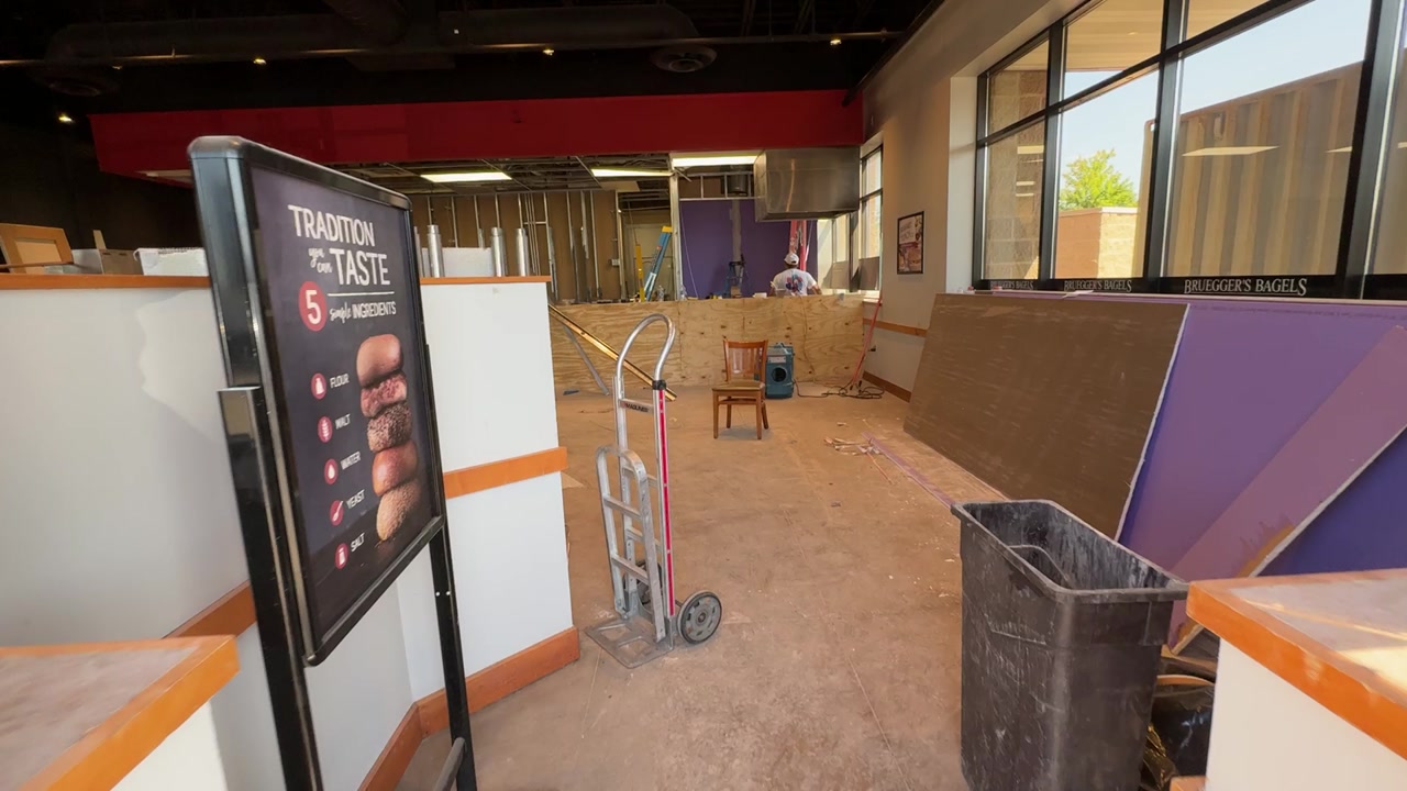 Bruegger's Bagels restaurant tenant fitup — counter and signage visible
